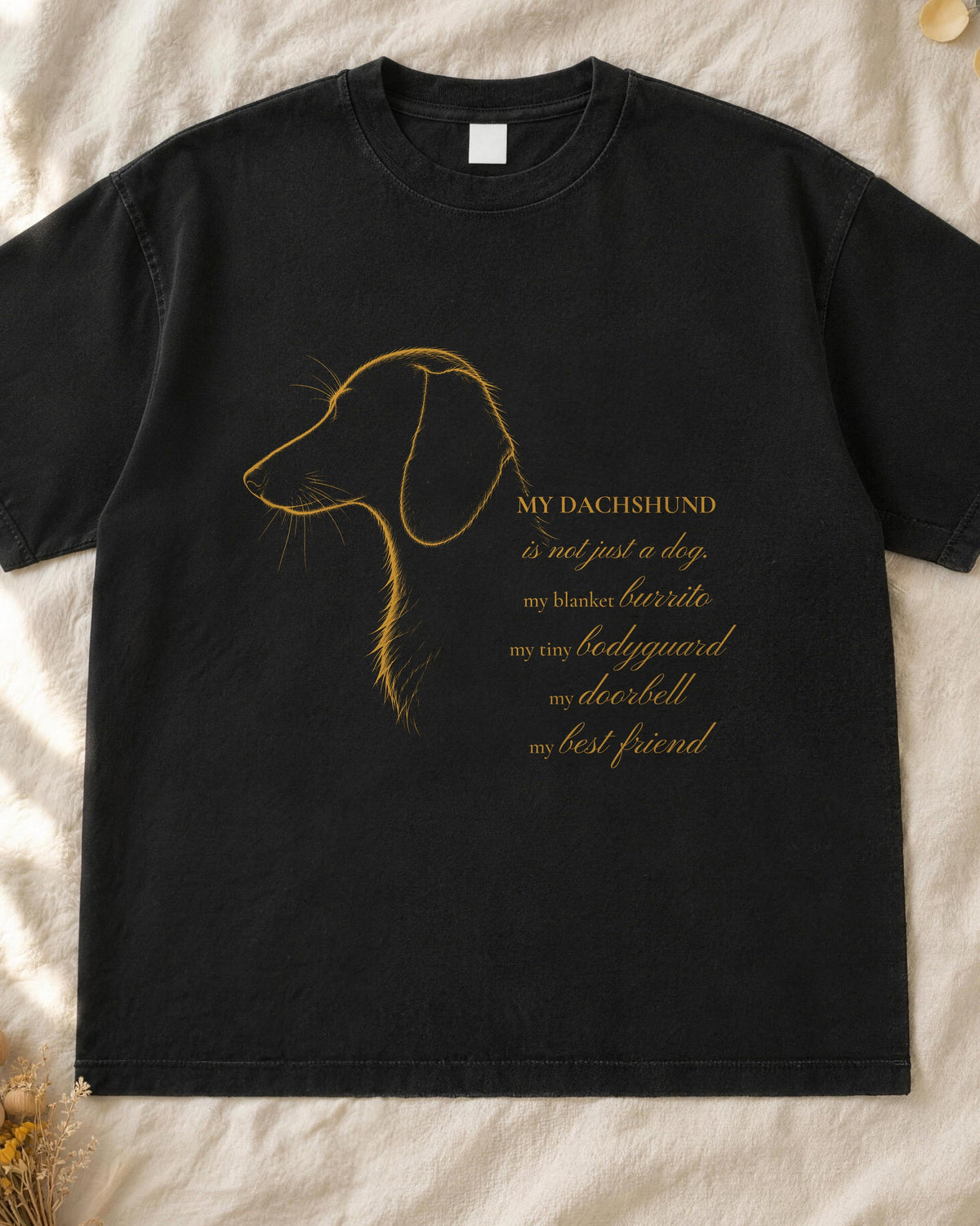 Dachshund portrait shirt, mustard line-art dachshund profile with handwritten script on a black Comfort Colors tee