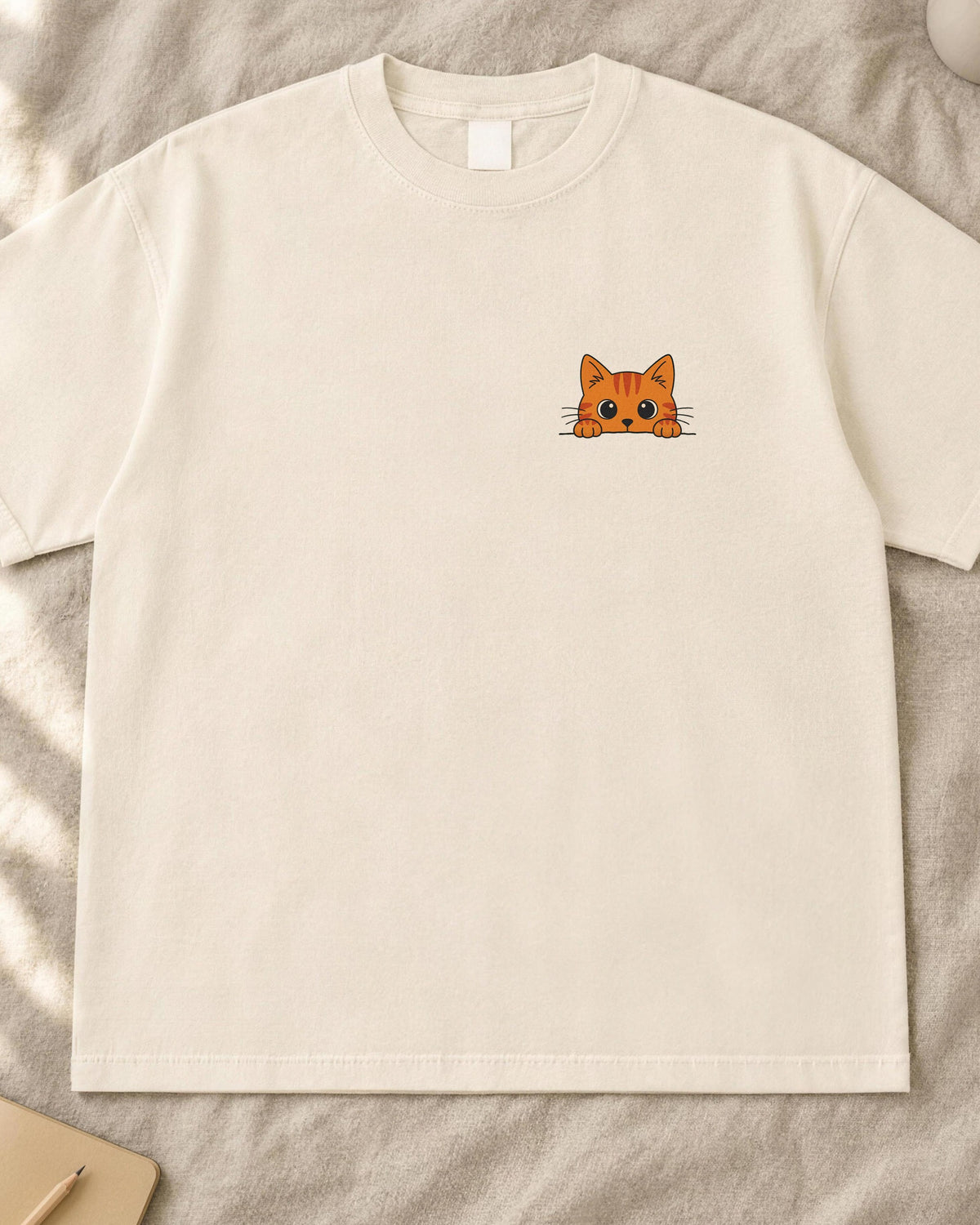 Peeking cat shirt, small orange tabby pocket print on an ivory Comfort Colors tee