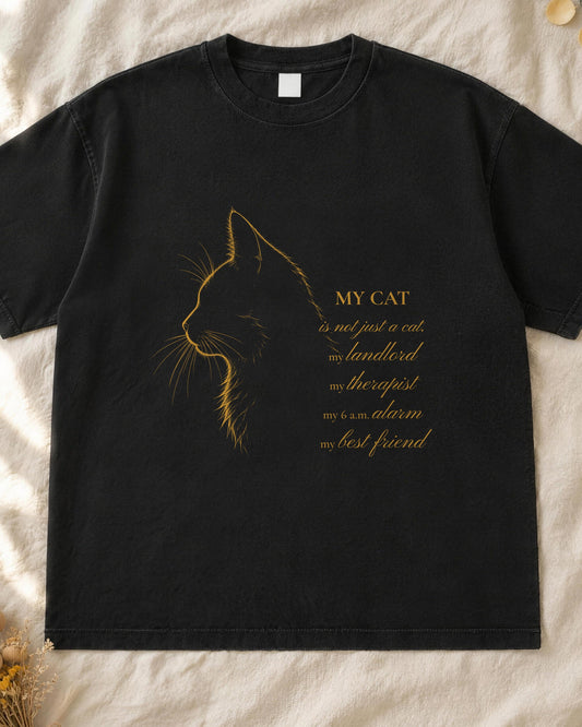 Cat portrait shirt, mustard line-art cat profile with handwritten script on a black Comfort Colors tee