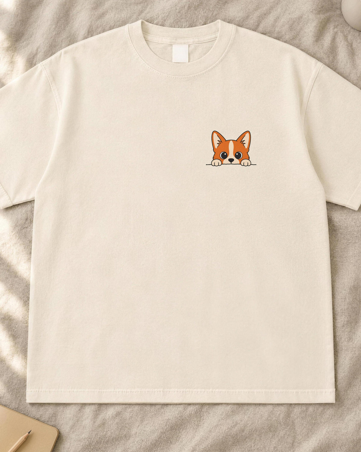 Peeking corgi shirt, small red and white corgi pocket print on an ivory Comfort Colors tee