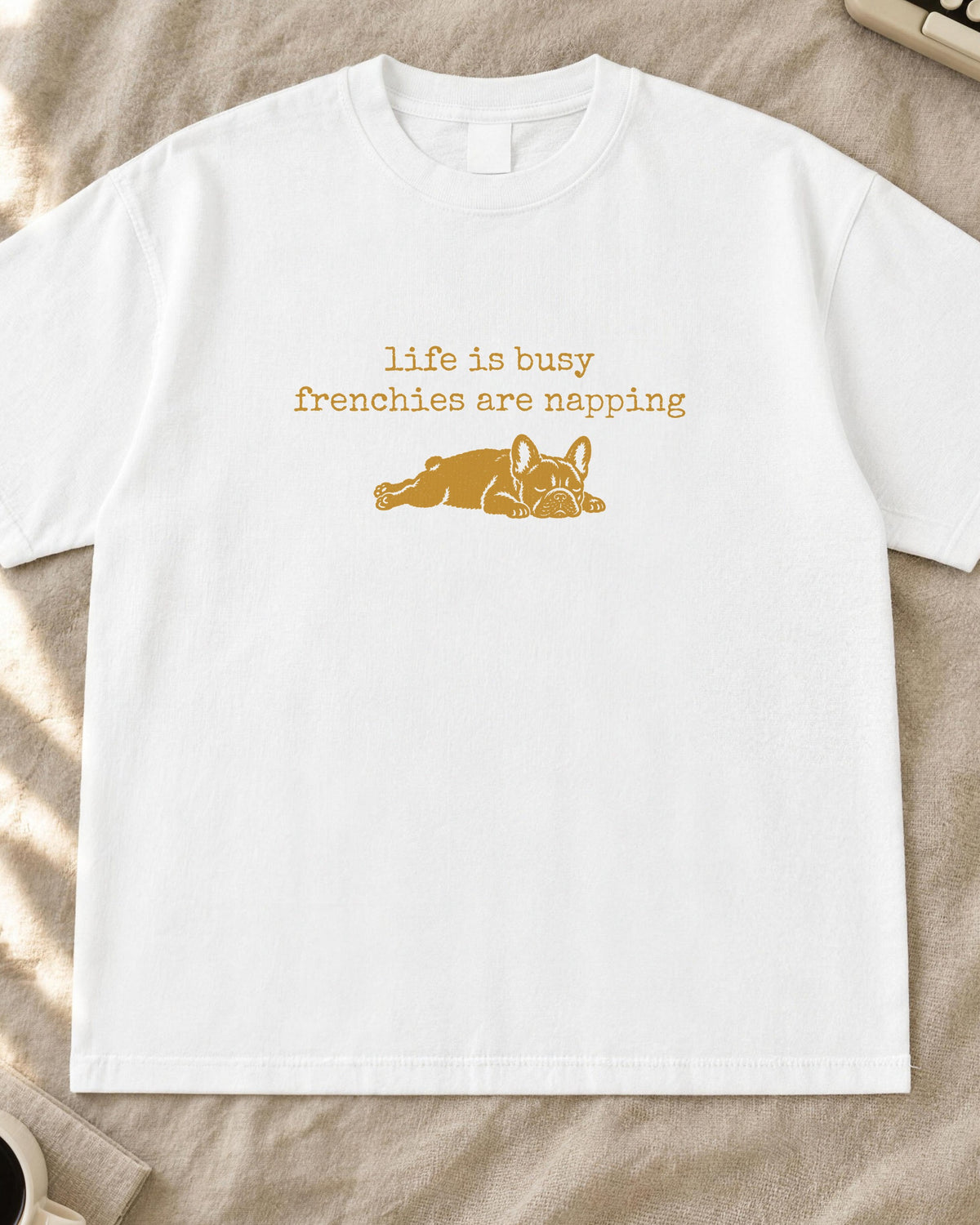 French bulldog shirt, life is busy frenchies are napping typewriter text with a napping frenchie stamp print in mustard on a white Comfort Colors tee